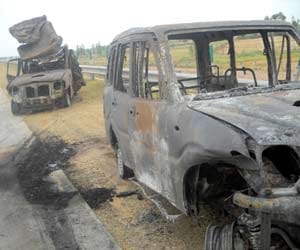  8 luxury cars burns in container