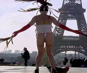 man dances with a cock tied to his penis