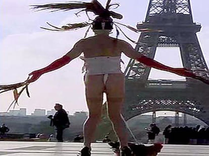 man dances with a cock tied to his penis
