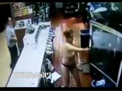women enters topless in a restaurant