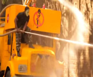 water from tanker sprayed on those urinating in public
