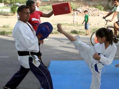 Worker's son will take Kung-Fu training in China