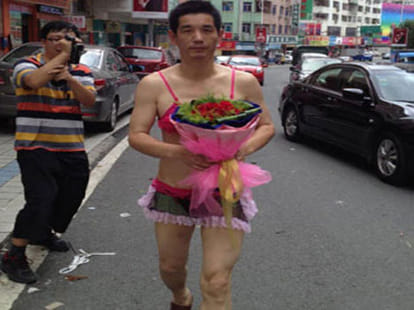 man proposes in bikini