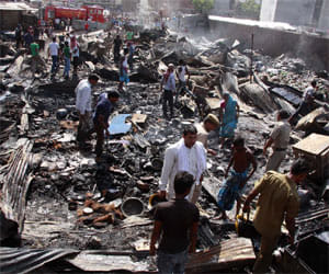 fire in slum by lpg cylender blast