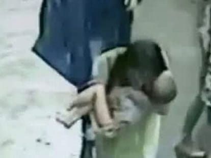 one year old saved while he accidently jumped from a building