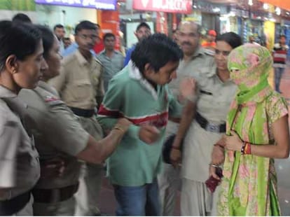 Mall raided, three arrested