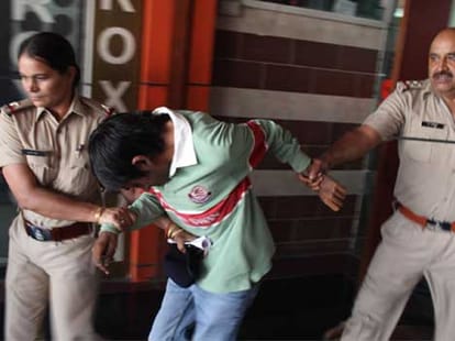 Mall raided, three arrested