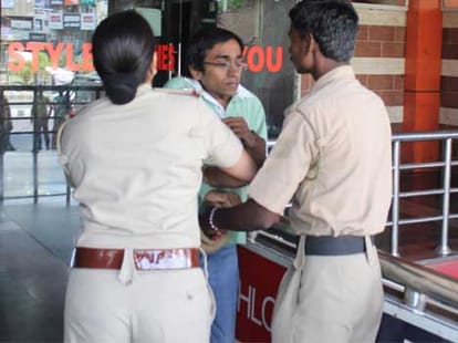 Mall raided, three arrested