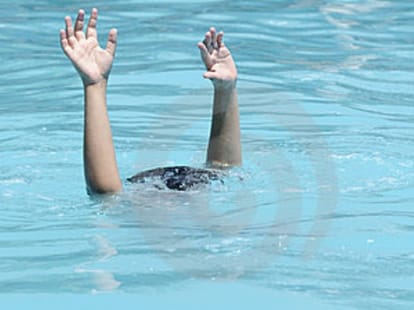three people swept away in flow.