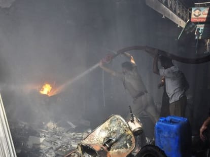 Couple beaten, then put in a restaurant fire