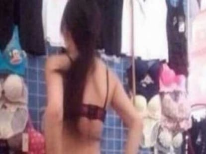 girl roams in the market flaunting bikini