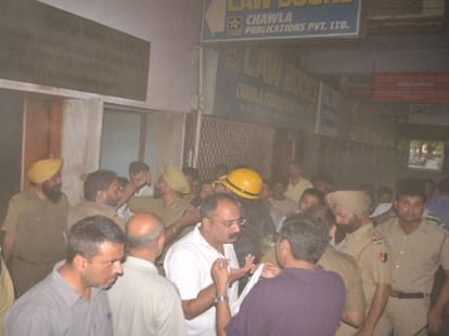 fire in chandigarh, Building collapses, Fireman debris