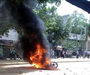 Curfew in Haryana town mewat after communal violence