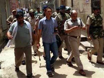 Curfew in Haryana town mewat after communal violence