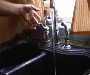 women found gold flakes in running water