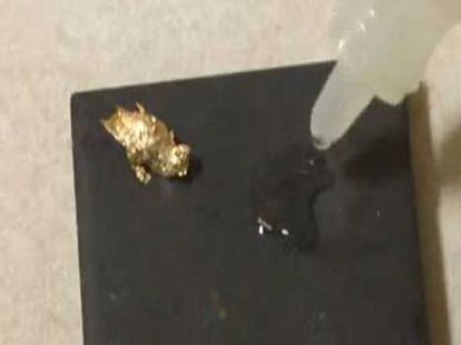 women found gold flakes in running water