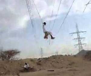boys use live naked wire as swings