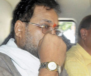 former minister laxmikant sharma arrested in mp