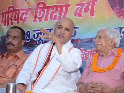 praveen togadiya raises question on narendra modi.
