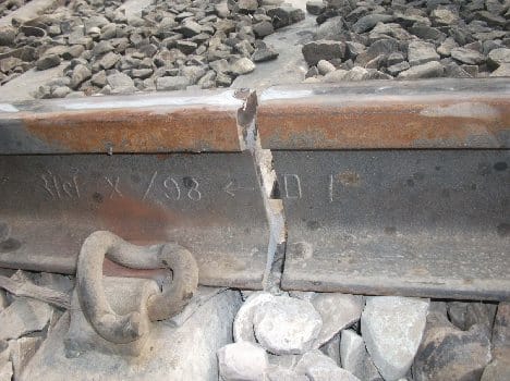 train run by damaged railway track