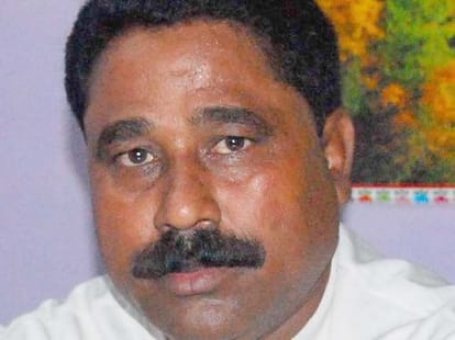 National Football Coach Selling Tea on Road