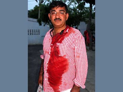 SP leader attacks on a village head