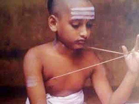 why people hold janeu on right side ear