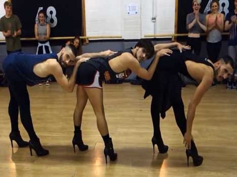 three men dancing like girls