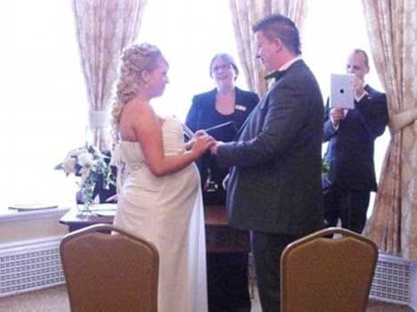 newly wed bride delivers baby just after wedding kiss