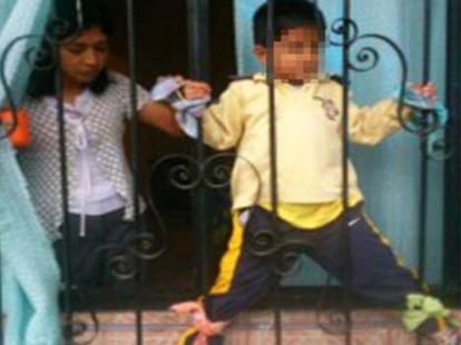 parents chained their four year old son to iron rods