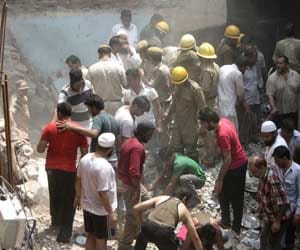 Two storey building collapse, one dead