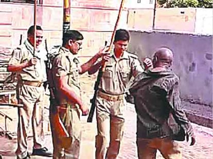 Police brutally beats a mentally weak person