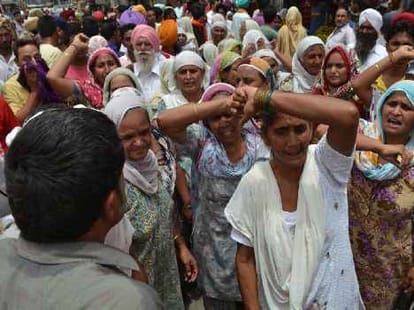 murder of brother and nephew for tube wells