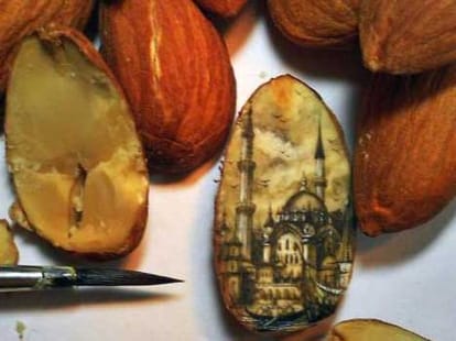 man who paints on dry fruits and chocolates