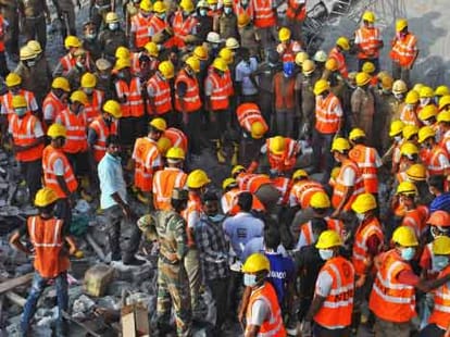 a man comes alive under the debris of building after 70 hours