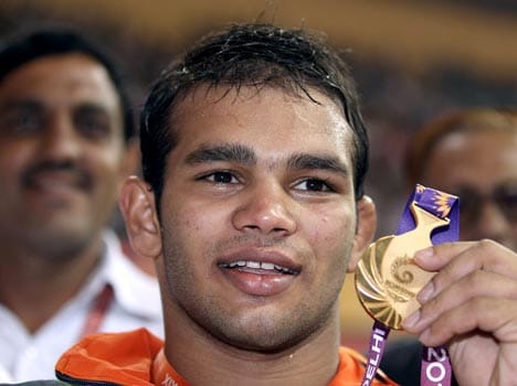 gold medalist wrestler caught cheating in police dept exam