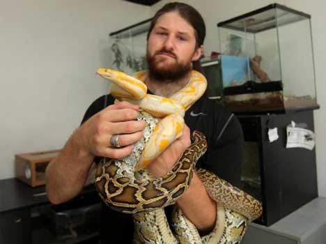 man who lives with exotic animals