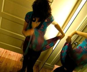 dancer caught in camera in changing room.