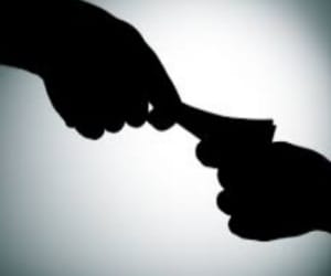 lady advocate beated for not giving bribe. 