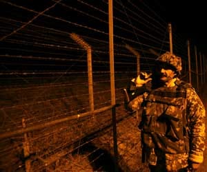 white flags planted on Pak posts