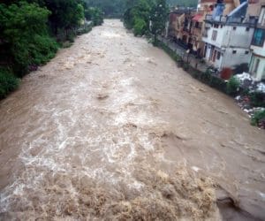 woman swept away with vehicle