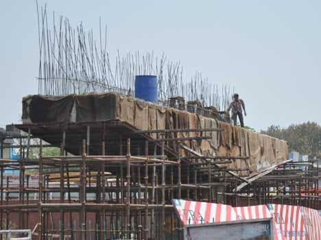 construction of bikram chowk flyover on slow speed