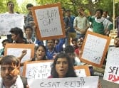 Female UPSC student protest in news way on raksha bandhan