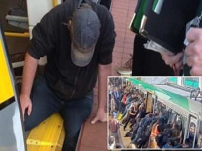perth commuters lifts train top escape leg stuck man