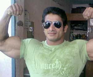 Mr Asia Suhas Khamkar arrested for taking bribe