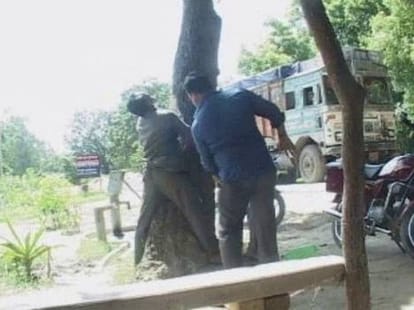 police men beats truck driver