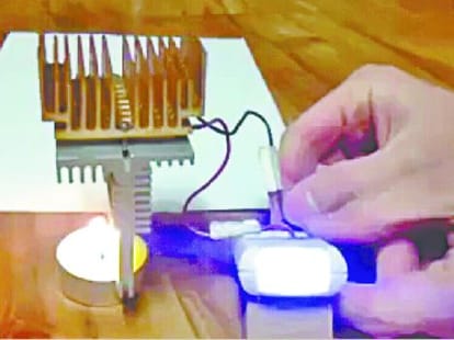 shammi kumar produces electricity from candle light