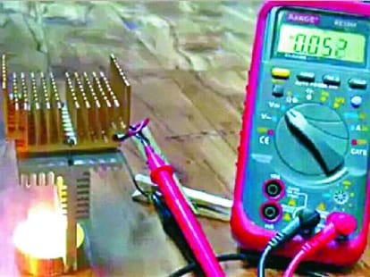 shammi kumar produces electricity from candle light