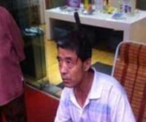 knife from eight storied building falls down into a man's head