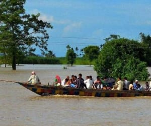 People surrounded by water
